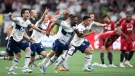 Vancouver Whitecaps players celebrate after defeating Toronto FC on penalty kicks during the Canadian Championship soccer final, in Vancouver, on Tuesday, July 26, 2022. THE CANADIAN PRESS/Darryl Dyck