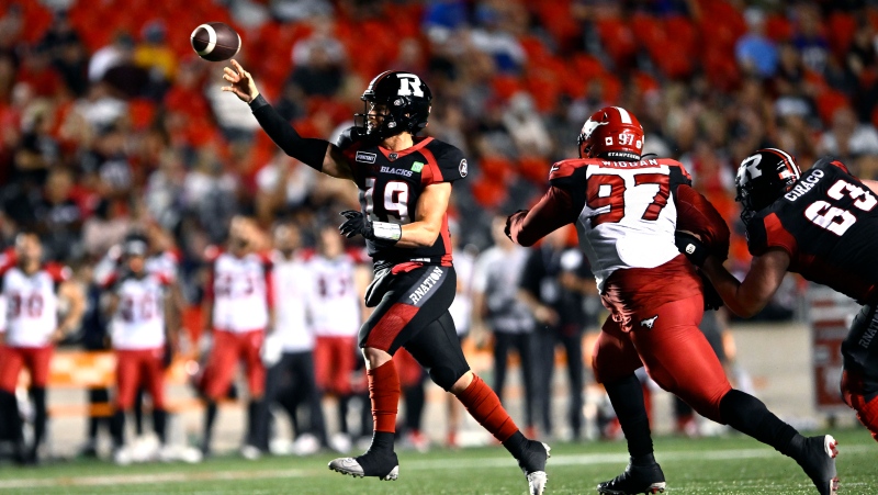 Ottawa Redblacks quarterback Nick Arbuckle (19) throws the ball during second half CFL football action against the Calgary Stampeders in Ottawa on Friday, Aug. 5, 2022. (Justin Tang/THE CANADIAN PRESS)