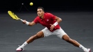 Team World's Felix Auger-Aliassime, of Canada, returns the ball to Team Europe's Matteo Berrettini, of Italy, at Laver Cup tennis, Friday, Sept. 24, 2021, in Boston. (AP Photo/Elise Amendola)