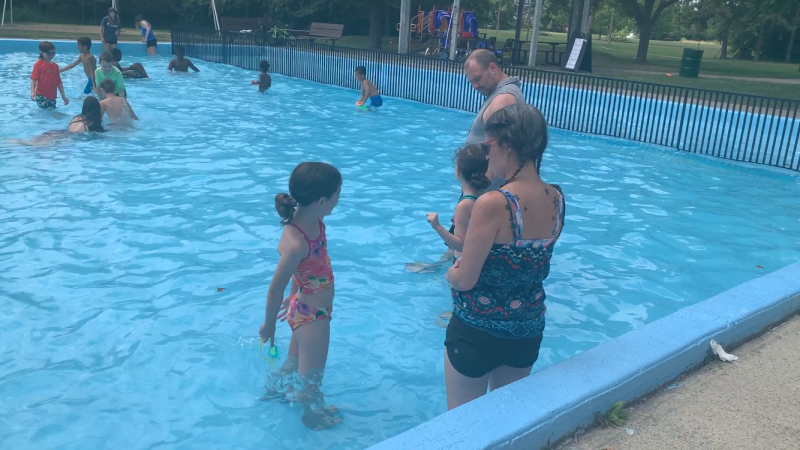 Dana Breton and her family beat the heat with a dip in the Balena Park wading pool on Saturday. (Jackie Perez/CTV News Ottawa) 