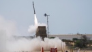 An Iron Dome air defence system launches to intercept a rocket fired from the Gaza Strip in Ashkelon, southern Israel on Aug. 7, 2022. Israel has killed two senior Islamic Jihad militants in three days of air strikes in the Gaza Strip, and Palestinian militants have launched nearly 600 rockets at Israel. Palestinian officials say at least 31 people in Gaza have died. (AP Photo/Ariel Schalit)