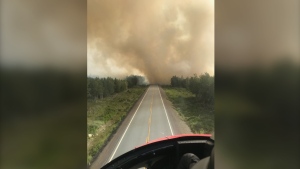 A forest fire in central Newfoundland has forced the closure of the the Bay d'Espoir Highway. The fire, south of Bishop Falls, N.L, is shown in this recent handout photo. (THE CANADIAN PRESS/HO-Government of Newfoundland & Labrador)