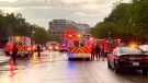 In this photo provided by @dcfireems, emergency medical crews are staged on Pennsylvania Avenue between the White House and Lafayette Park, Thursday evening, Aug. 4, 2022 in Washington. (@dcfireems via AP)