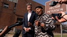 U.S. Secretary of State Antony Blinken listens as Antoinette Sithole, the sister of the late Hector Pieterson, right, speaks to members of the media after touring the Hector Pieterson Memorial in Soweto, South Africa on Aug. 7, 2022. Peaceful child protesters were gunned down by police 30 years ago in an attack that awakened the world to the brutality of the apartheid regime. (AP Photo/Andrew Harnik, Pool)