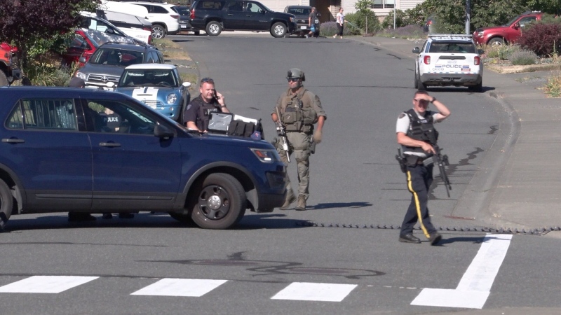 Images from the scene show officers with long guns outside the residence. (CTV)