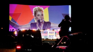 Actress Anne Heche is seen on a screen at the Drive-In to Erase MS gala in Pasadena, Calif., on Sept. 4, 2020. (Chris Pizzello / AP) 