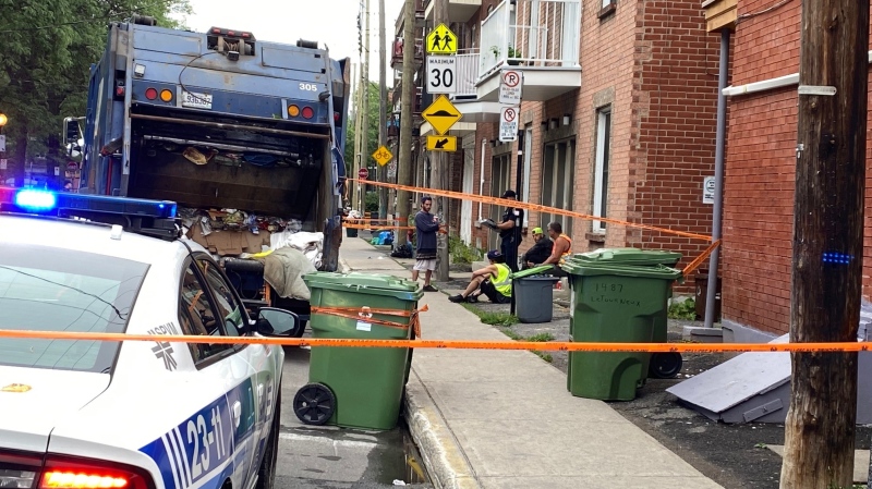 Montreal police are investigating after a body was found in the trash in Hochelaga-Maisonneuve on Aug. 8, 2022 (Iman Kassam, CTV News)
