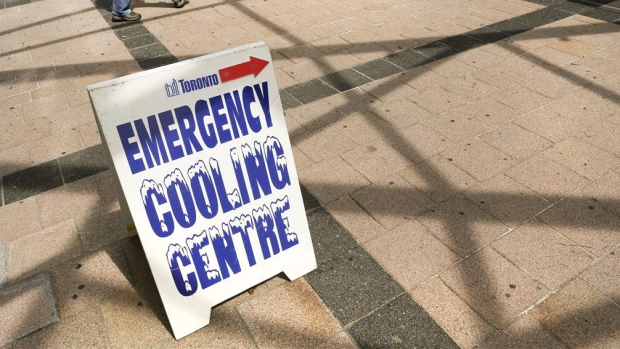 A sign for an emergency cooling centre in Toronto, which are no longer available, can be seen above. (Twitter/@joecressy)