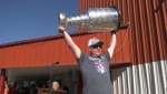 Ray Bennett, assistant coach with the Colorado Avalanche, brings the Stanley Cup to Innisfail, Alta. on Monday, Aug. 8, 2022. 