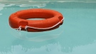 A lifebuoy is seen floating in a swimming pool. (Source: PIXABAY/Ninita_7)