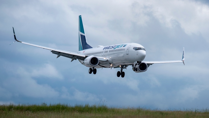 A WestJet flight from Calgary arrives at Halifax Stanfield International Airport in Enfield, N.S. on Monday, July 6, 2020. THE CANADIAN PRESS/Andrew Vaughan.