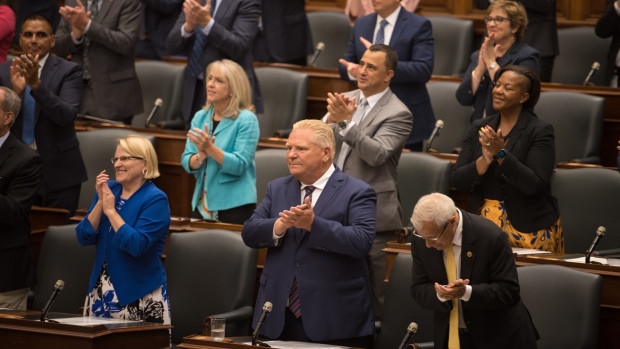 Ontario Premier Doug Ford claps during Ted Arnott's acceptance speech for his re-election to the position of Speaker of the Ontario Legislative Assembly at Queen's Park, in Toronto on Monday, August 8, 2022. THE CANADIAN PRESS/Tijana Martin 