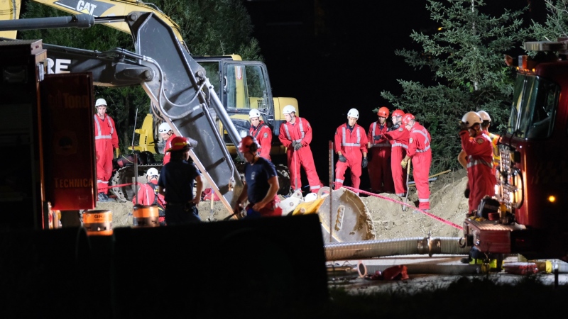 Rescue workers are pictured at the scene of a trench collapse in Ajax Monday August 8, 2022. (Simon Sheehan /CP24) 