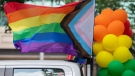 Rainbow flags and coloured balloons are shown at the site where the Montreal Pride parade was supposed to start from in Montreal, Sunday, August 7, 2022. Festival organizers cancelled the parade over concerns for security due to the lack of staff. THE CANADIAN PRESS/Graham Hughes 