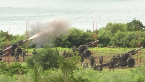 Taiwan's military conducts artillery live-fire drills at Fangshan township in Pingtung, southern Taiwan, Aug. 9, 2022. (AP Photo/Johnson Lai)
