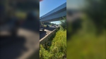 Dump truck hits an overpass on Highway 402 near Strathroy, Ont. on Aug. 9, 2022. (OPP/Twitter)