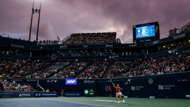 Leylah Fernandez of Canada returns a ball to Storm Sanders of Australia during women’s tennis action at the National Bank Open in Toronto, Monday, Aug. 8, 2022. THE CANADIAN PRESS/Cole Burston