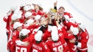 Team Canada celebrates defeating the United States to win gold at the IIHF Women's World Championship in Calgary, Tuesday, Aug. 31, 2021. (Jeff McIntosh / THE CANADIAN PRESS)