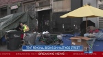 Tent removal underway on Hastings St.