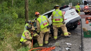 Two people were injured in a two-vehicle crash on Snake Island Road. One person was trapped in their vehicle. Aug. 9, 2022. (Ottawa Fire Service/Twitter)