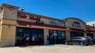 This photo shows the exterior of Hair World Salon in Dallas, on May 12, 2022. A man accused of shooting three Asian American women at the hair salon was indicted Tuesday, Aug. 9, on multiple counts, including committing a hate crime. (AP Photo/Jamie Stengle, File)