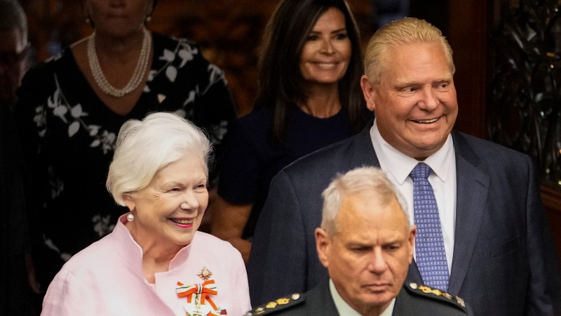 Ontario Lt.-Governor Elizabeth Dowdeswell, left, and Ontario Premier Doug Ford enter the Legislative Chamber before the Throne Speech at Queens Park in Toronto, on Tuesday, August 9, 2022. THE CANADIAN PRESS/Andrew Lahodynskyj 