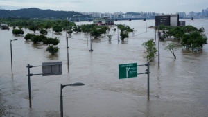 A part of a park along the Han River are flooded due to heavy rain in Seoul, South Korea, Wednesday, Aug. 10, 2022. Cleanup and recovery efforts gained pace in South Korea's greater capital region Wednesday as skies cleared after two days of record-breaking rainfall that unleashed flash floods, damaged thousands of buildings and roads and killed multiple people. (AP Photo/Ahn Young-joon)