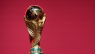 The Qatar FIFA World Cup trophy on display in Dubai, United Arab Emirates, on May 12, 2022. (Kamran Jebreili / AP)