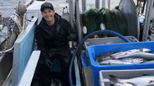 Kris Dudoward is shown aboard the commercial fishing vessel Irenda earlier this week with catch of sockeye salmon on B.C.’s Skeena River near Prince Rupert. THE CANADIAN PRESS/HO-Mitch Dudoward