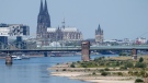 The river Rhine is pictured with low water in Cologne, Germany, Wednesday, Aug. 10, 2022. (AP Photo/Martin Meissner)
