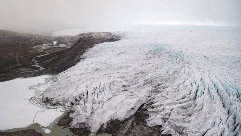New research published on August 11 shows the Arctic is warming four times faster than the remainder of the planet. A receding glacier in Greenland is seen here in 2021. (Saul Loeb/Pool/Reuters/CNN)
