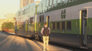 A pedestrian waits for a GO train in Kitchener. (Tyler Kelaher/CTV News Kitchener)