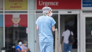 A health-care worker is shown outside a hospital in Montreal, July 14, 2022. THE CANADIAN PRESS/Graham Hughes