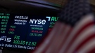 A screen displays market data at the New York Stock Exchange in New York, on Aug. 10, 2022.