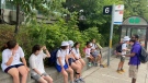 Children participating in Epilepsy South Central Ontario’s Sunny Days camp are shown waiting for a MiWay bus in Mississauga on Aug. 4. One of the organizers of the camp says that the group was accosted by a 'rude' and 'aggressive' driver. (Submitted/CP24,com)