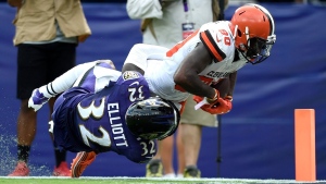 Cleveland Browns wide receiver Jarvis Landry (80) is tackled just shy of the goal line by Baltimore Ravens defensive back DeShon Elliott (32), during a game in Baltimore, on Sept. 29, 2019. (Gail Burton / AP) 