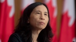 Chief Public Health Officer Theresa Tam listens to a question during a news conference, Tuesday, January 12, 2021 in Ottawa. THE CANADIAN PRESS/Adrian Wyld 