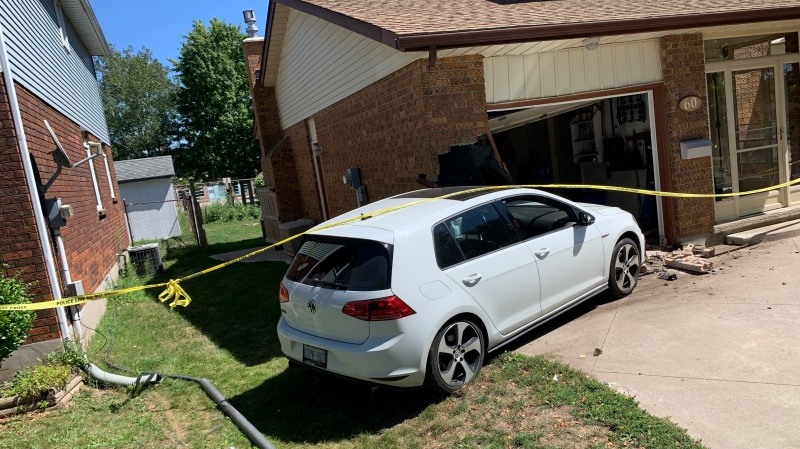 The car that slammed into Carmen Mazza's house. (Krista Sharpe/CTV News Kitchener)