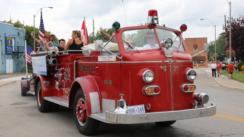 Lee Burrows drives an antique fire truck during a previous WAMBO event. (Source: Aaron Hall)