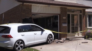 Kitchener man watches car crash into his home