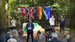 Erik Wieman speaks at the memorial ceremony to honour the crew of RCAF Halifax bomber NP711 on August 6, 2022. (Source: Erik Weiman)
