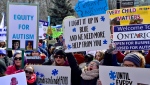 Hundreds of parents, therapists and union members gather outside Queen's Park, in Toronto on Thursday, March 7, 2019, to protest the provincial government's changes to Ontario's autism program. THE CANADIAN PRESS/Frank Gunn