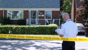 Toronto police at a Scarborough home in the area of Midland Avenue and Kingston Road after receiving reports of a stabbing on Saturday Aug. 13, 2022 (CP24/ Simon Sheehan).