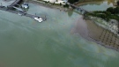 This photo posted to social media shows a diesel spill in Richmond's Steveston Harbour (Credit: Twitter/StevestonShips)