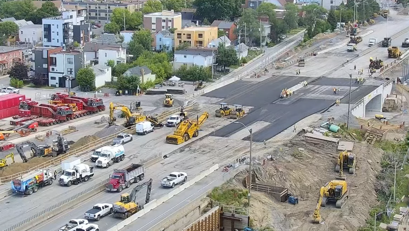 Crews continue work to replace the Booth Street Bridge along the Queensway Sunday afternoon. (CEECAM Corporation/YouTube) 