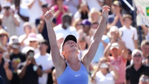 Simona Halep, of Romania, reacts after defeating Beatriz Haddad Maia, of Brazil, during National Bank Open final tennis tournament action in Toronto on Sunday, August 14, 2022. THE CANADIAN PRESS/Nathan Denette