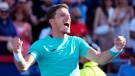 Pablo Carreno Busta, of Spain, reacts after defeating Hubert Hurkacz, of Poland, to win the National Bank Open final tennis tournament in Montreal, Aug. 14, 2022. THE CANADIAN PRESS/Paul Chiasson