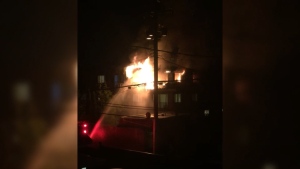 Apartment fire displaces dozens