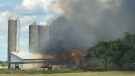 Smoke rises in the air during a barn fire on Aug. 15. (Karen Vollmer/Submitted)