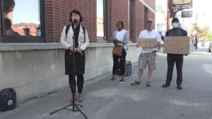 Shensi Zhang, a former international student, is now a permanent resident of Canada. She spoke at a 'Status for All' rally in downtown Sudbury. Aug. 15/22 (Alana Everson/CTV Northern Ontario)